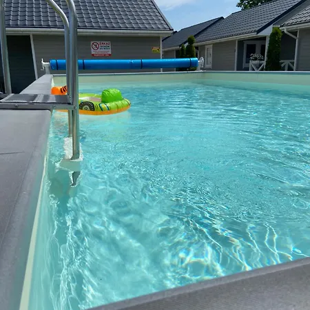 Domki Nad Rozlewiskiem De Lux Sarbinowo Basen Podgrzewany, Malpi Gaj- 4 Pietrowy W Swietlicy 160M2, Tyrolka-Dla Dzieci, Rowery, Ognisko Holiday home *